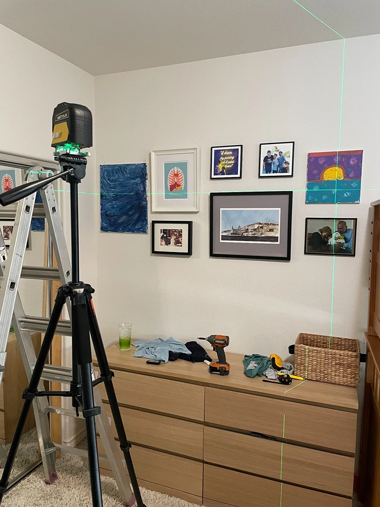 Professional Picture Hanging Using Laser Level by Handy Ivan in San Diego, CA.