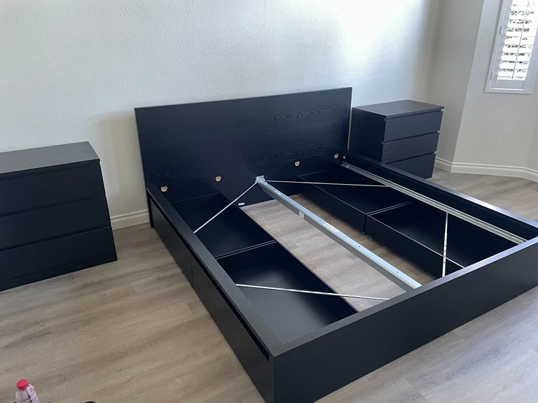 Black Bed Frame Assembly in Bedroom by Handy Ivan in San Diego, CA.