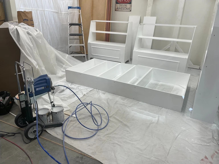 Retail Custom White Storage Shelf Assembly and Painting by Handy Ivan in San Diego, CA.